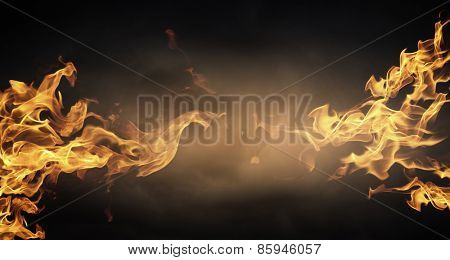 Conceptual image of burning fire on dark background