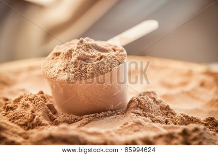 Whey protein scoop. Sports nutrition food after gym.