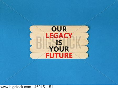 Legacy And Future Symbol. Concept Words Our Legacy Is Your Future On Wooden Stick. Beautiful Blue Ta