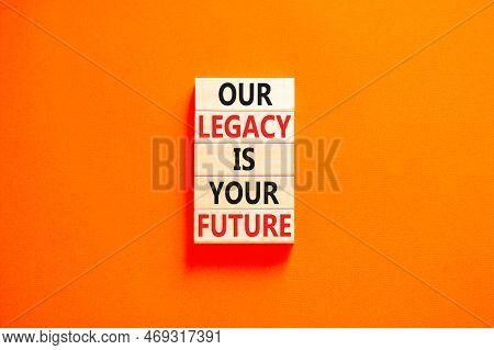 Legacy And Future Symbol. Concept Words Our Legacy Is Your Future On Wooden Blocks. Beautiful Orange