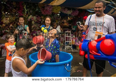 Bangkok, Thailand - April 13, 2014 : The Songkran festival or Thai New Year's festival in JJ market in Bangkok, Thailand.