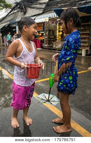 Bangkok, Thailand - April 13, 2014 : The Songkran festival or Thai New Year's festival in JJ market in Bangkok, Thailand.