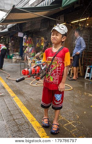 Bangkok, Thailand - April 13, 2014 : The Songkran festival or Thai New Year's festival in JJ market in Bangkok, Thailand.