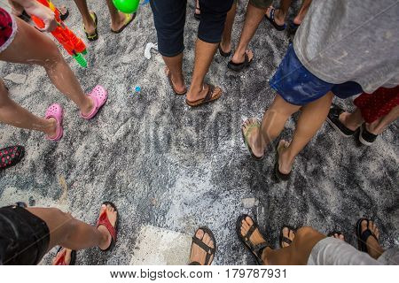 Bangkok, Thailand - April 13, 2014 : The Songkran festival or Thai New Year's festival on Silom street in Bangkok, Thailand.