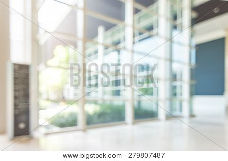 Blur Hotel Or Office Lobby Background Interior View Toward Reception Hall, Modern Luxury White Room 