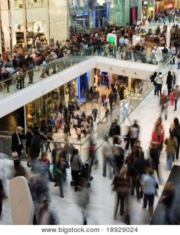 Crowd in the mall (motion blurred)