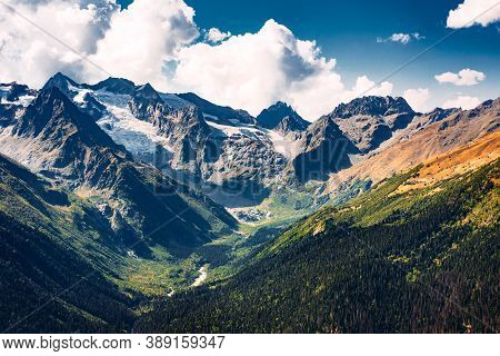 Stunning View Of The Mountain Gorge. Mountain Landscape. Beautiful View Of The Snow-capped Mountain 