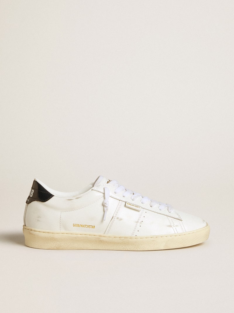 Matchstar in white leather with dark blue leather heel tab