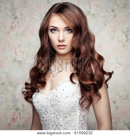 Portrait Of Beautiful Sensual Woman With Elegant Hairstyle. Wedding Dress