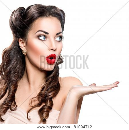 Surprised Retro woman portrait. Beauty vintage girl showing empty copy space on the open hand palm for text, isolated on white background. Proposing a product. Gestures for advertisement.