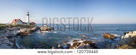 A panorama of the Portland Head lighthouse and rugged coastline, Maine, USA