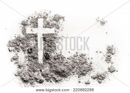 Christian cross or crucifix drawing in ash, dust or sand as symbol of religion, sacrifice, redemtion, Jesus Christ, ash wednesday, lent, Good Friday