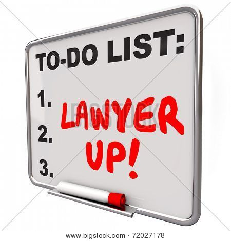 Lawyer Up words written with red marker or pen on a to-do list dry erase board reminding you to hire an attorney to handle a legal problem or lawsuit