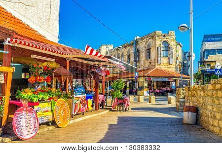 TEL AVIV ISRAEL - FEBRUARY 25 2016: The old town of Jaffa is full of colorful cozy cafes offering the best dishes of the local cuisine on February 25 in Tel Aviv.