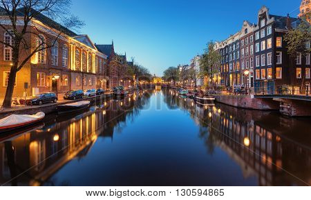 Beautiful Night Cityscape With Canals Of Amsterdam, Netherlands