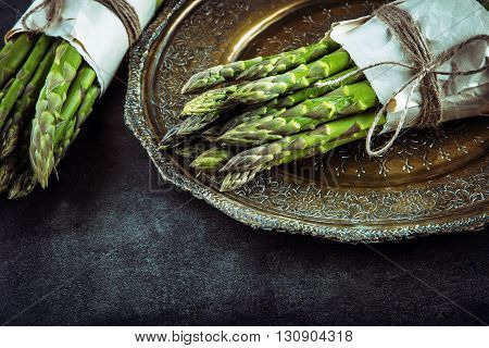 Asparagus. Raw asparagus. Fresh Asparagus.Green Asparagus. Tied asparagus in other positions.