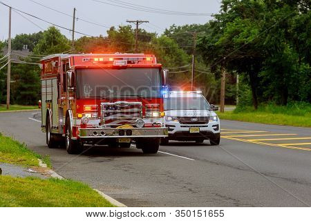 10 February 2020 East Brunswick Nj Usa: Fire Trucks In Fire Department On Emergency 911 And Police C