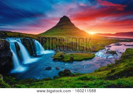 Fantastic evening with Kirkjufell volcano the coast of Snaefellsnes peninsula. Picturesque and gorgeous morning scene. Location famous place Kirkjufellsfoss waterfall, Iceland, Europe. Beauty world.