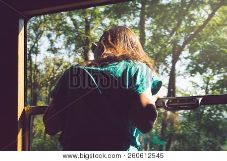 Vintage Photo Of Girl Traveling By Train In Vacation.. Vintage Photo Of Traveler Girl In Vacation. G