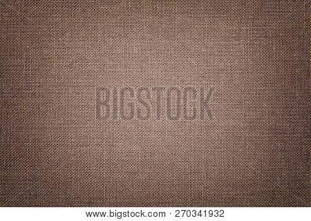 Dark Brown Background From A Textile Material With Wicker Pattern, Closeup. Structure Of The Light B