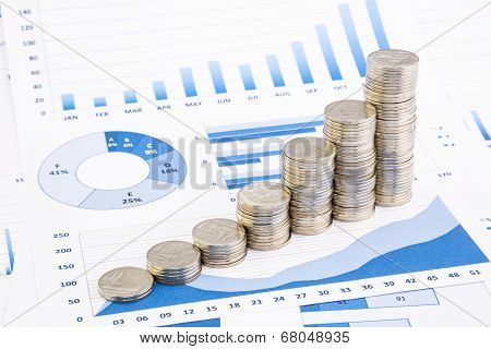 Stacks Of Coins On  Graphs And Charts