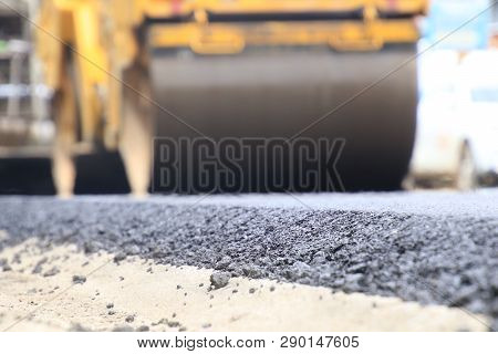 Road Construction Asphalt Road By Worker And Roller Machine. Asphalt Road Background