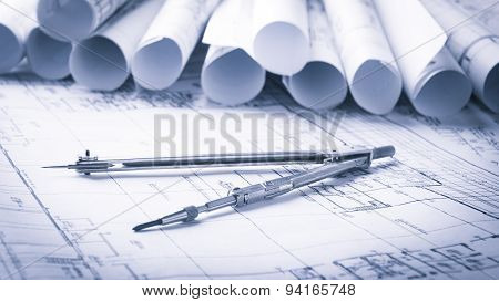 rolls of architecture blueprints and house plans