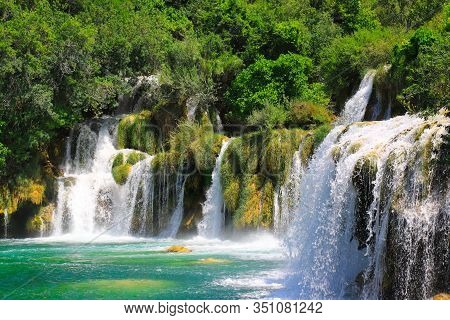 A Picturesque Waterfall Among Large Stones In The Krka Waterfalls, Lakes Landscape Park, Croatia In 