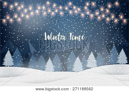 Winter Time. Holiday Winter Landscape For New Year Holidays With Firs, Light Garlands, Falling Snow.