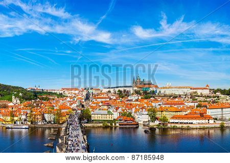 Prague: Mala Strana,  Charles bridge and Prague castle view from Old Town bridge tower over Vltava river in daytime. Prague, Czech Republic