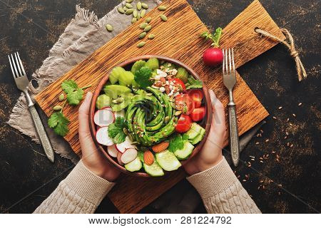 Healthy Vegan Diet Salad With Fresh Vegetables-avocado, Radish, Tomato, Cucumber, Celery, Nuts And S