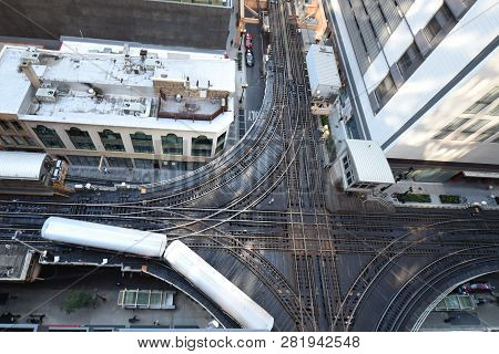 Looking Down On A Chicago Commuter Subway Train In The Downtown Loop Business District Turning The C