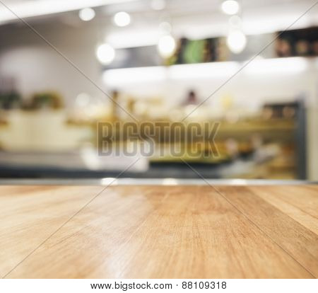 Table top with blurred kitchen interior background