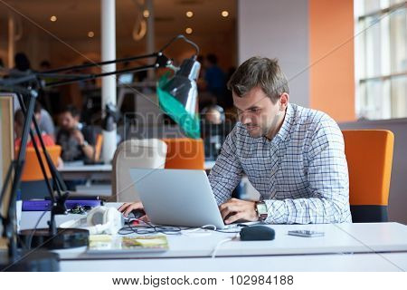 startup business, software developer working on computer at modern office