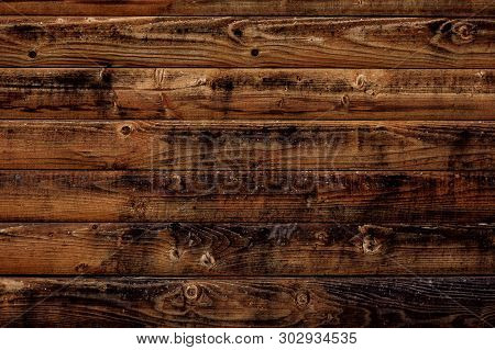 Old Wood Texture Background. Dark Brown Wooden Boards, Planks. Surface Of Dark Shabby Weathered Parq