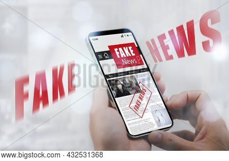 Fake News Online On Smartphone Concept, Businessman Reading Fake News Or Articles About Covid-19 In 