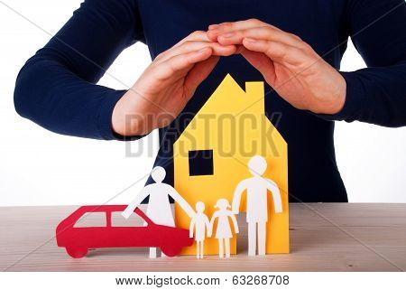 Hands Protecting House, Family And Car