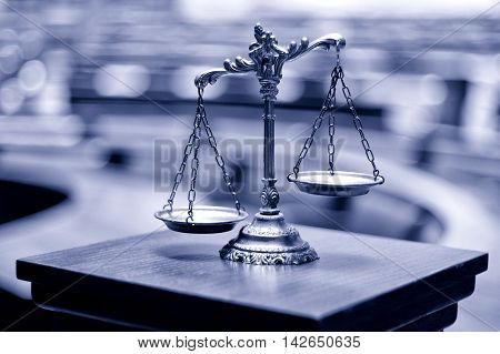 Symbol of law and justice in the empty courtroom law and justice concept.