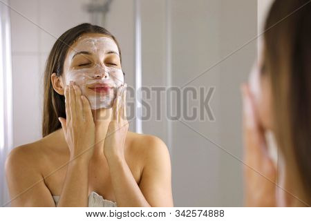 Skincare Woman Washing Face  Foaming Soap Scrubbing Skin. Face Wash Exfoliation Scrub Soap Woman Was