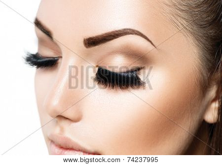 Beauty face makeup. Make up. Eyelashes extensions. Perfect Make-up closeup. Foundation. Cosmetic Eyeshadows, eyebrows. Beauty Girl with Perfect Skin. Eyelashes. Makeover 