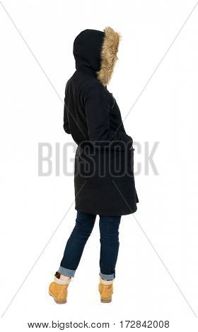 Back view woman in winter jacket  looking up.   Standing young girl in parka. Rear view people collection.  backside view of person.  Isolated over white background. 