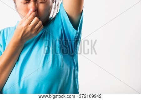 Closeup Young Asian Young Woman Hyperhidrosis Sweating. Female Have Armpit Sweat Stain On Her Clothe