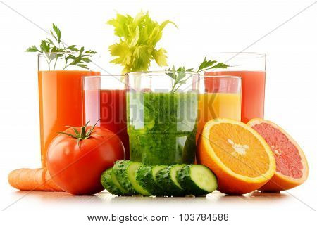 Glasses With Fresh Organic Vegetable And Fruit Juices On White