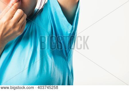 Closeup Young Asian Young Woman Hyperhidrosis Sweating. Female Have Armpit Sweat Stain On Her Clothe