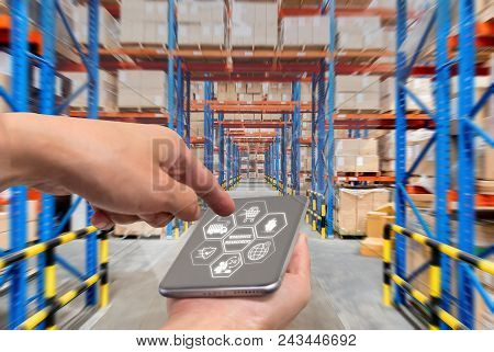 Businessman With Touchscreen Tablet To Login Application For Inspection Checking Inventory In Stock 