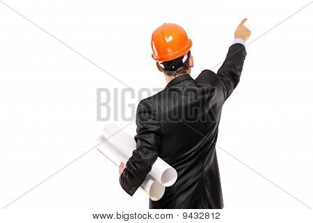 View Of A Foreman In Suit Pointing