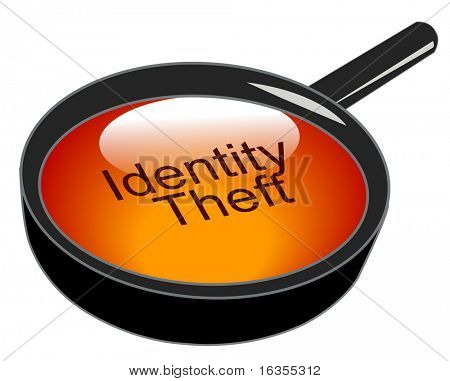 magnifying glass over top of identity theft