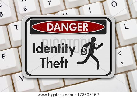 ID theft danger sign A black and white danger sign with text Identity theft and theft icon on a keyboard 3D Illustration