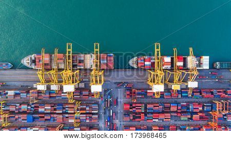 container ship in import export and business logistic.By crane Trade Port Shippingcargo to harbor.Aerial view.Water transport.International.Shell Marine.Top view.