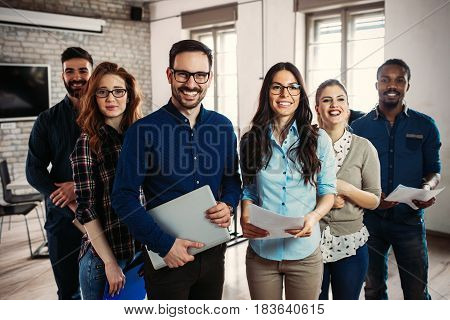 Successful company with happy employees in modern office